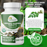 Grenera Organic Moringa Tablets bottle with a measuring spoon