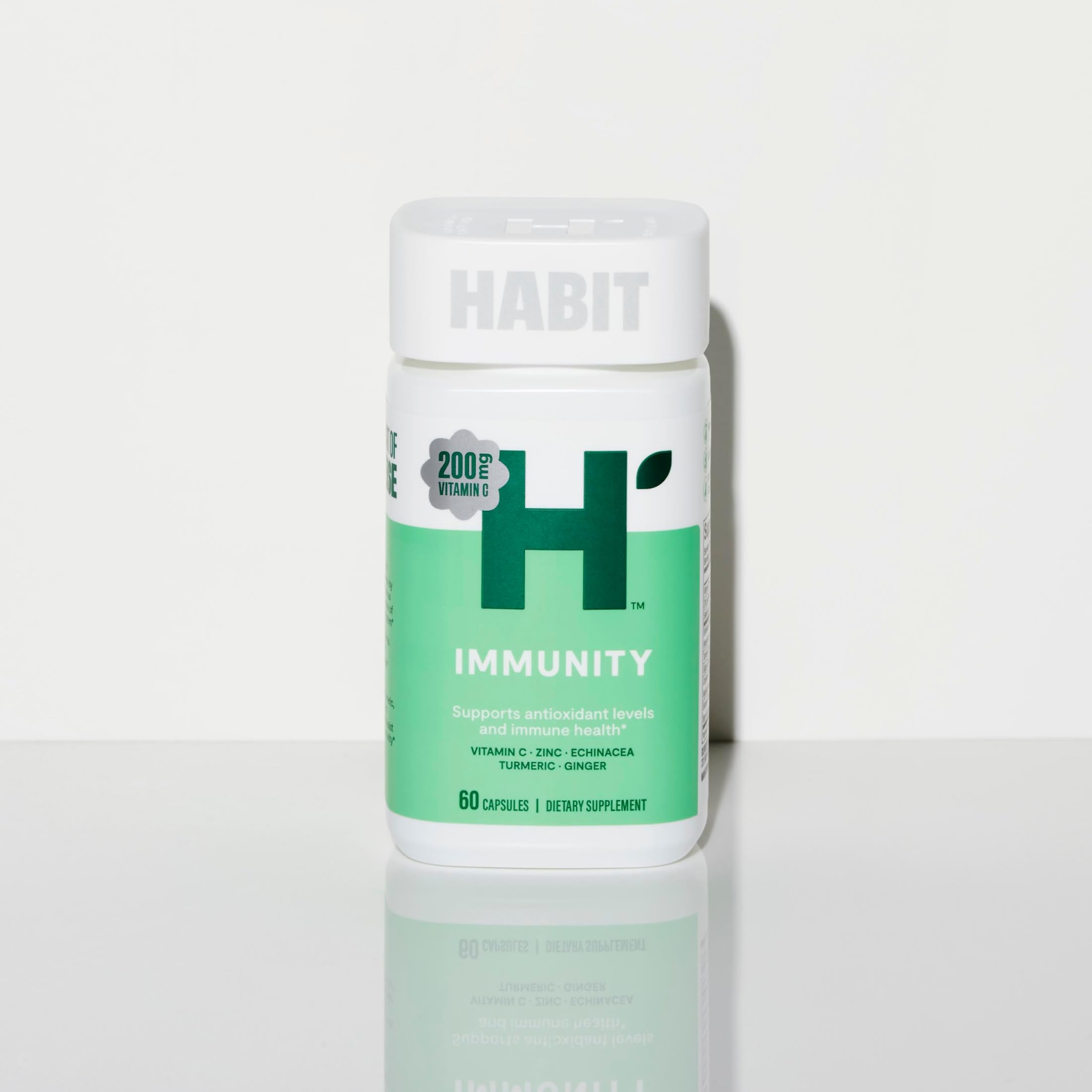H' Habit daily wellness Blend Capsules close-up of the capsule