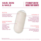 H' Habit Hair, Skin & Nails capsules on a wooden surface