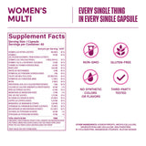 H' Habit Women's Multivitamin capsules on a wooden table