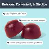 Habit + Habitat Saw Palmetto Gummies on a wooden table with fresh pomegranate