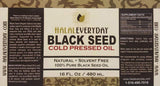 Halaleveryday black seed oil on a wooden surface