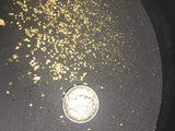 Hand scooping Colorado Gold Paydirt for panning
