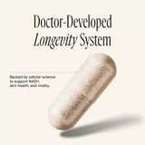 Happy Aging Resveratrol Supplement capsules on a wooden surface