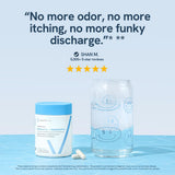 Happy V Women's Probiotic Supplement on a wooden table
