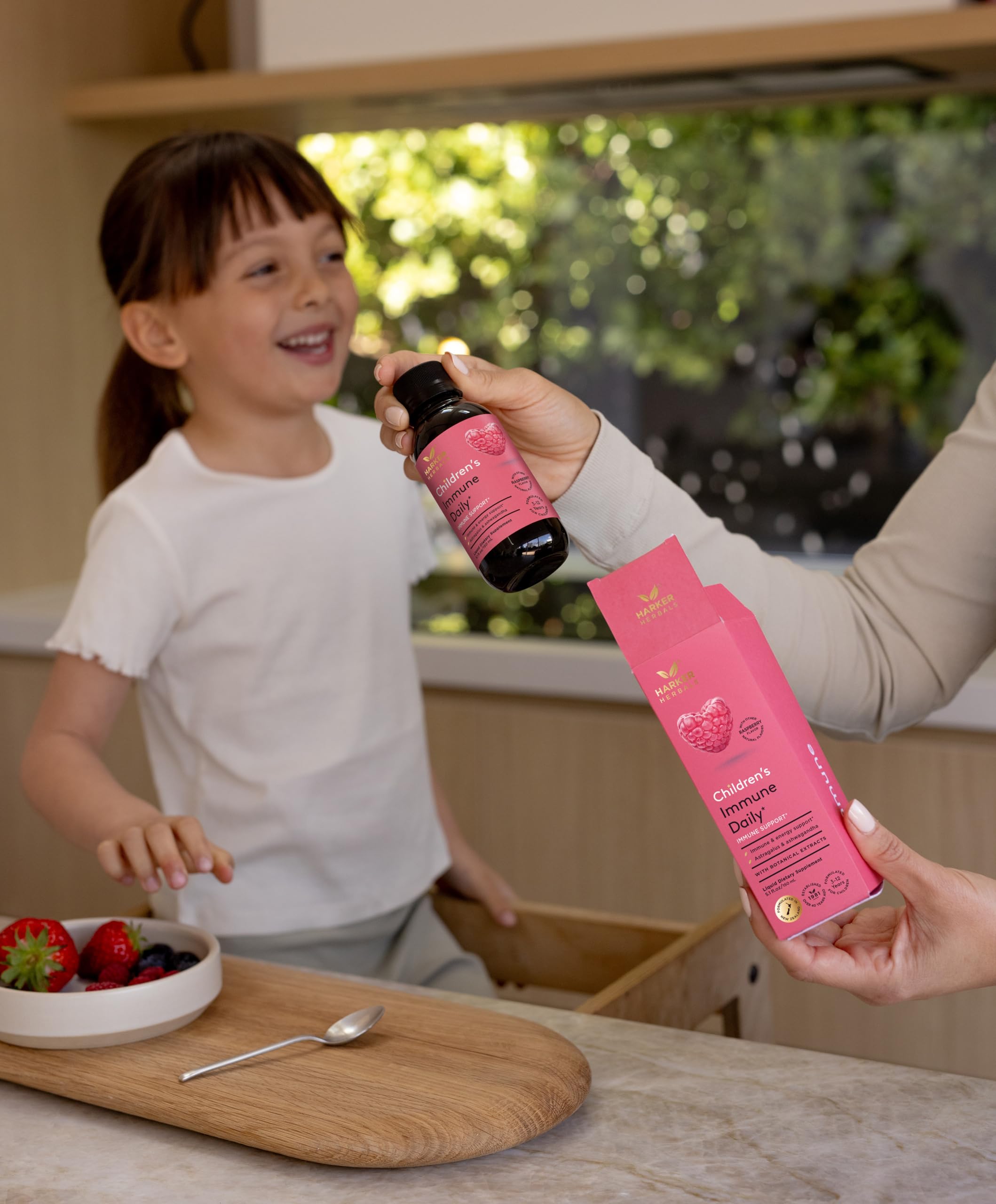 Harker Herbals Kids Herbal Syrup 231g with a spoon for easy dosing