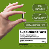 HARMONIFY Moringa Capsules 750mg with a glass of water