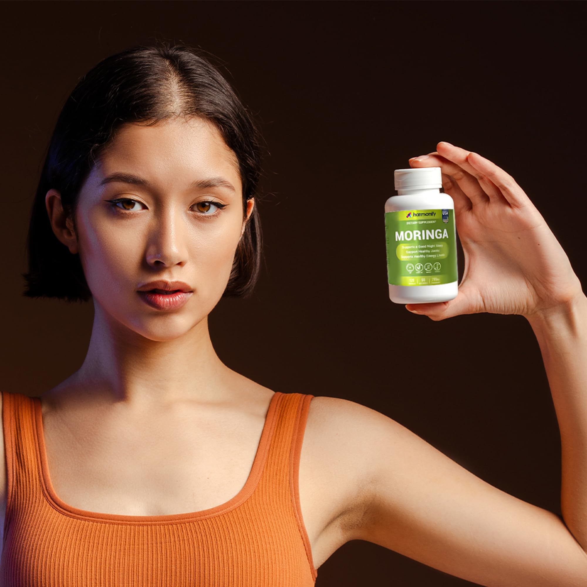 HARMONIFY Moringa Capsules displayed with other health supplements