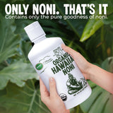 Healing Noni Noni Juice 1065g on a wooden table