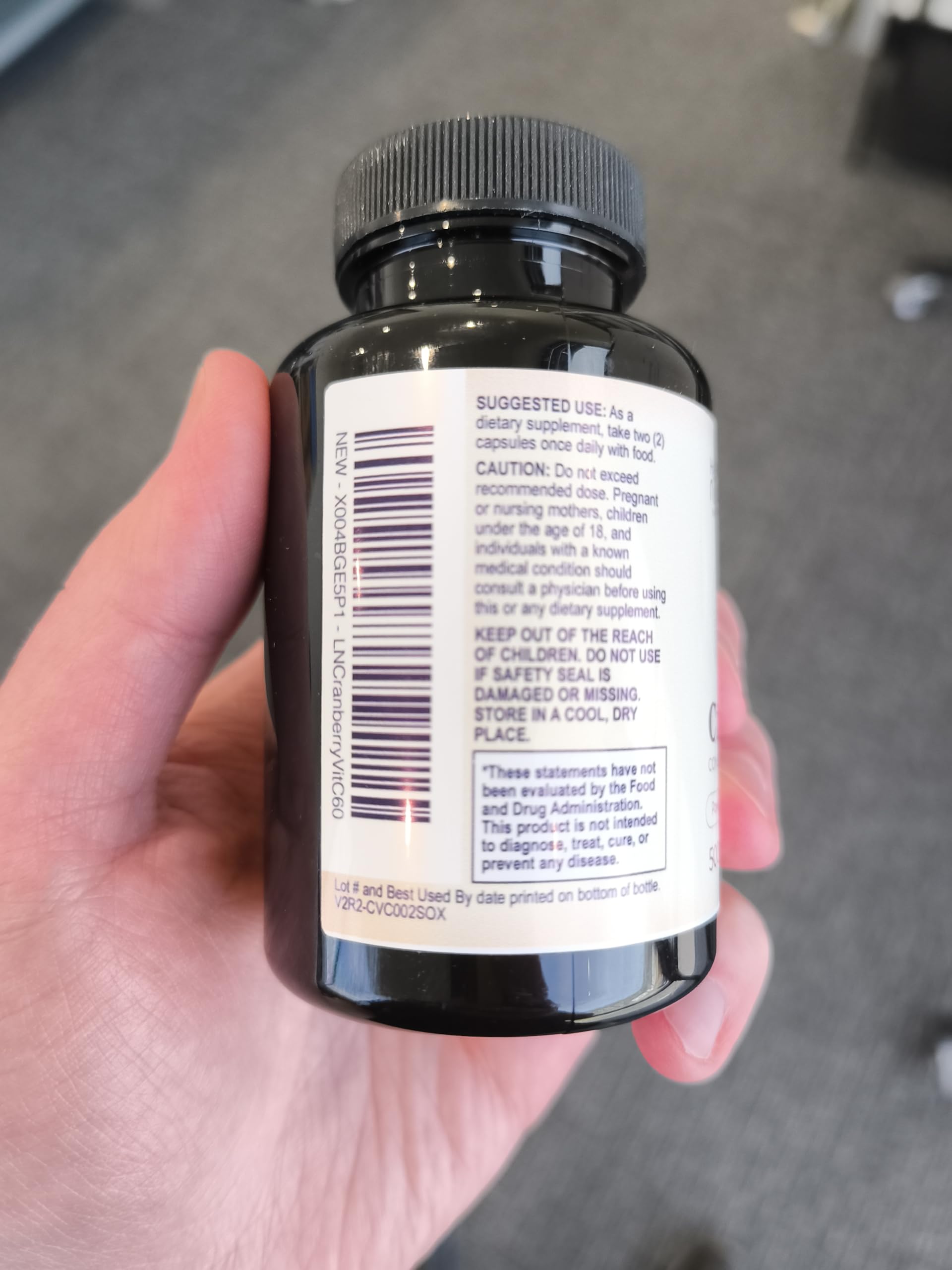 Health Nutrition Naturals Cranberry Extract Capsules on a wooden table