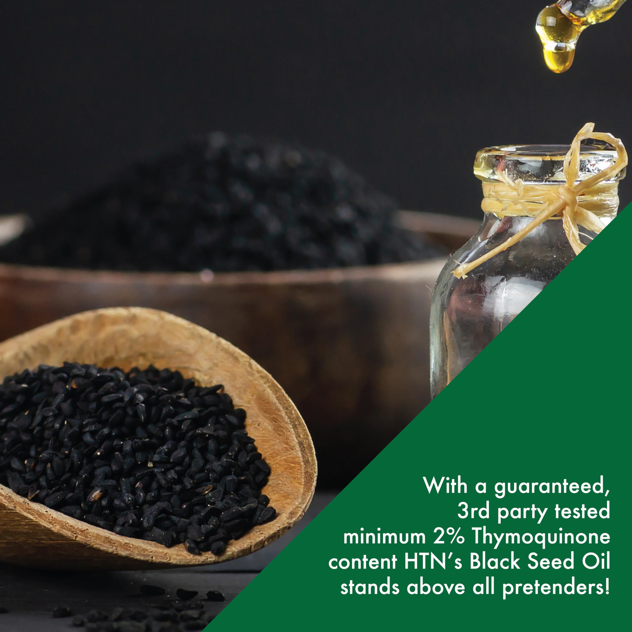 Health Thru Nutrition Black Seed Oil Softgels 500mg product with a measuring spoon