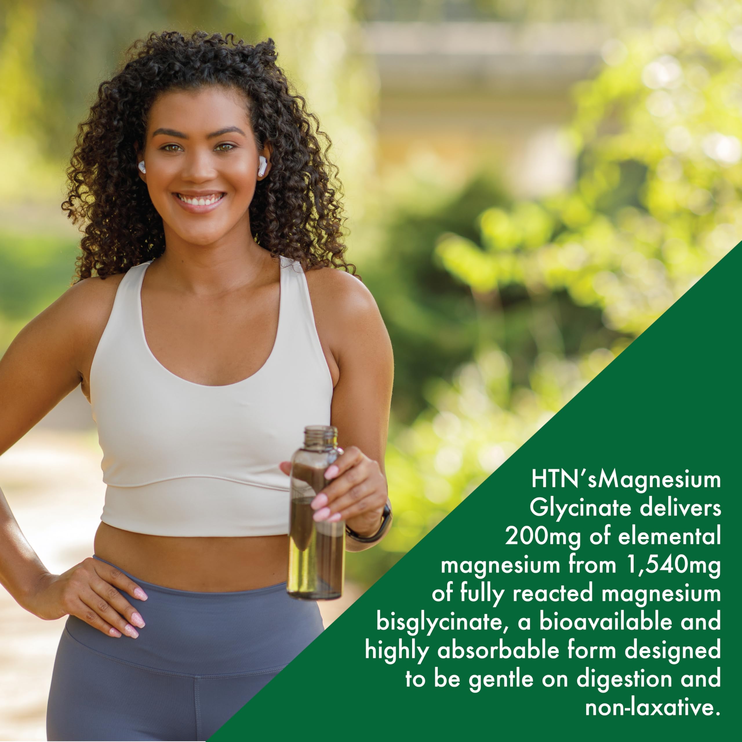 Health Thru Nutrition Magnesium Glycinate 240 tablets with a glass of water
