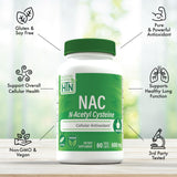 Health Thru Nutrition N-Acetyl Cysteine 600mg capsule on a wooden table