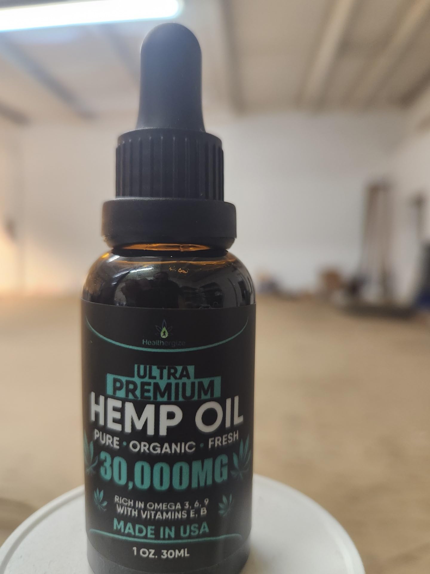 Healthergize Organic Hemp Seed Oil 5-Pack displayed on a shelf