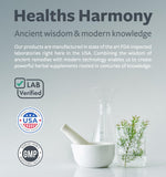 Healths Harmony Organic Super Greens Tablets in a hand
