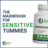 Healthy Gut Magnesium Glycinate Supplement on a wooden table