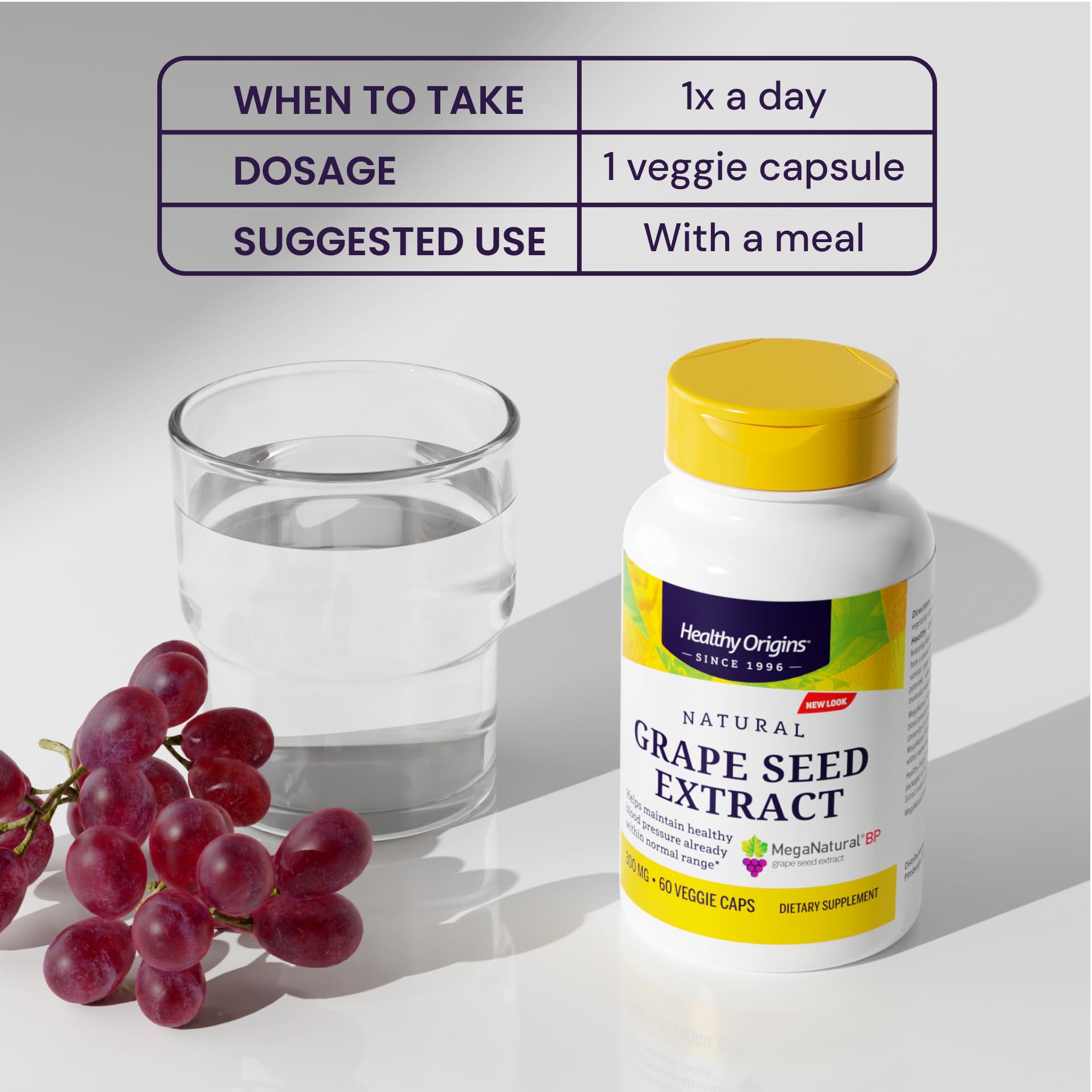 Healthy Origins MegaNatural-BP Grape Seed Extract capsules in hand