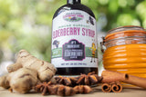 Heartland Organic Elderberry Syrup 1551g in a glass