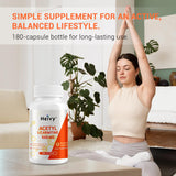 Heivy Acetyl L-Carnitine capsules on a wooden table