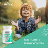 Heivy Calm & daily wellness Tablets in a child's hand