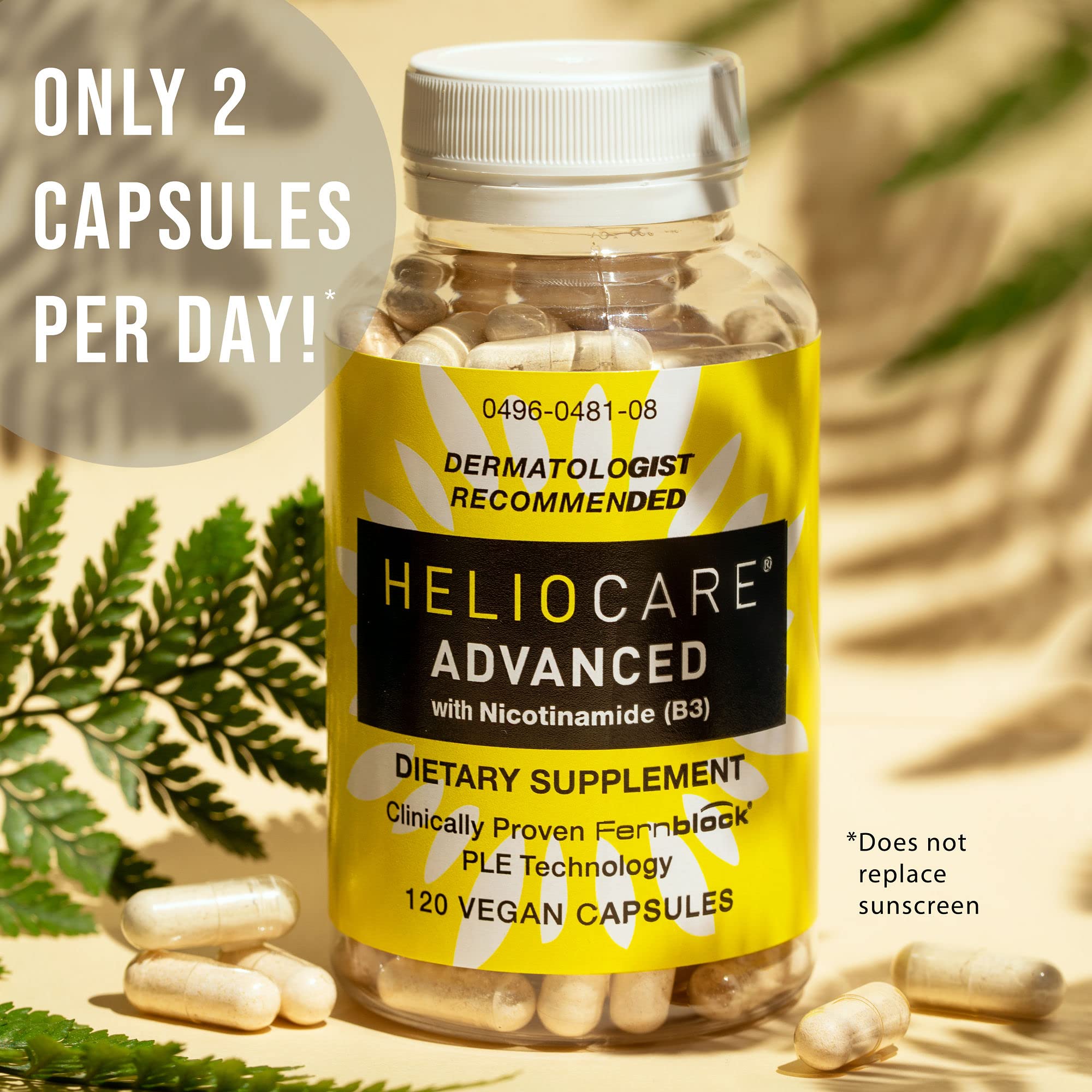 Heliocare Advanced Vitamin B3 Niacin capsules with a glass of water