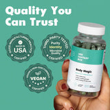 Her Fantasy Box Body Magic Chlorophyll Capsules on a wooden table