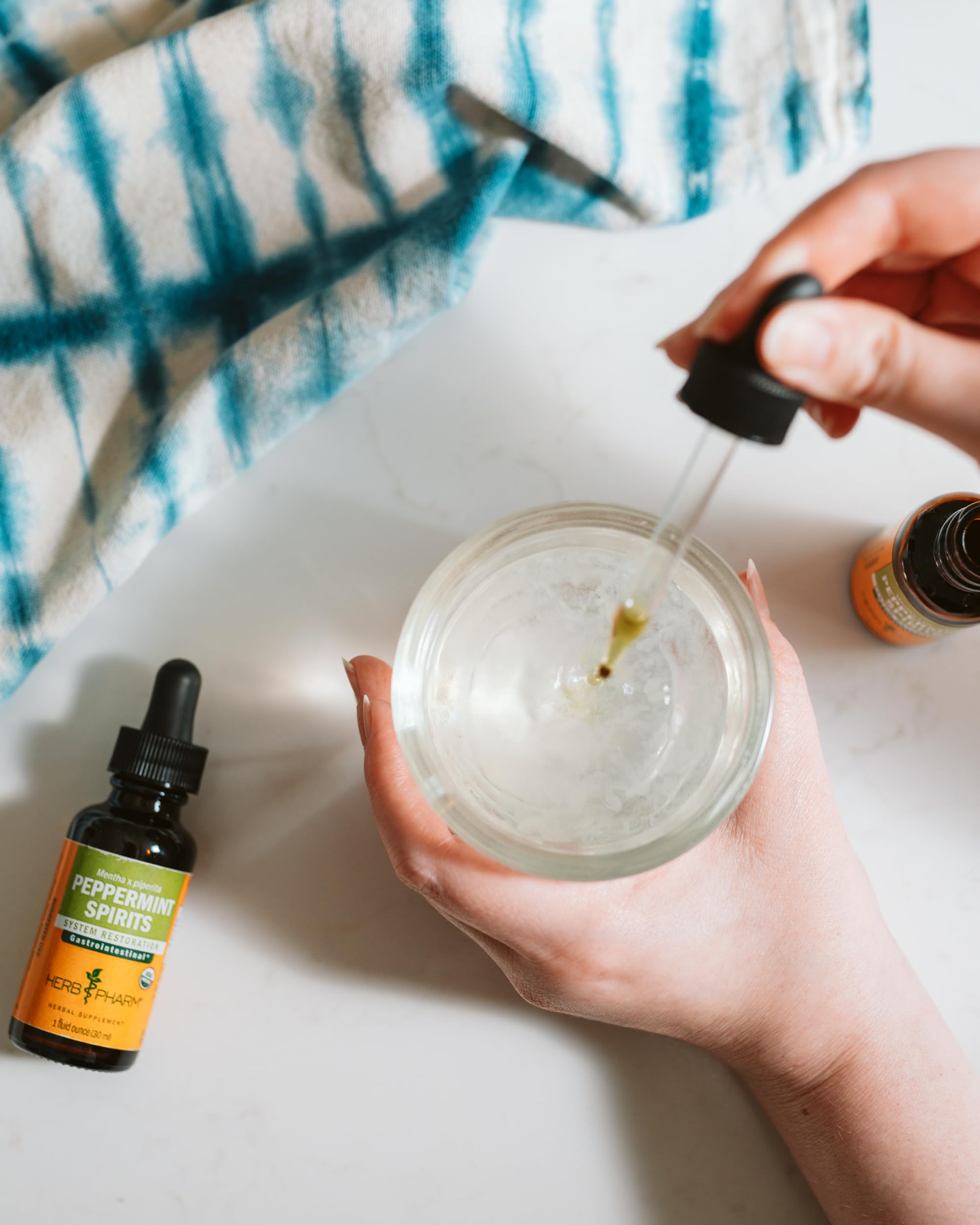 Herb Pharm Peppermint Spirits Tincture 1 oz on wooden table