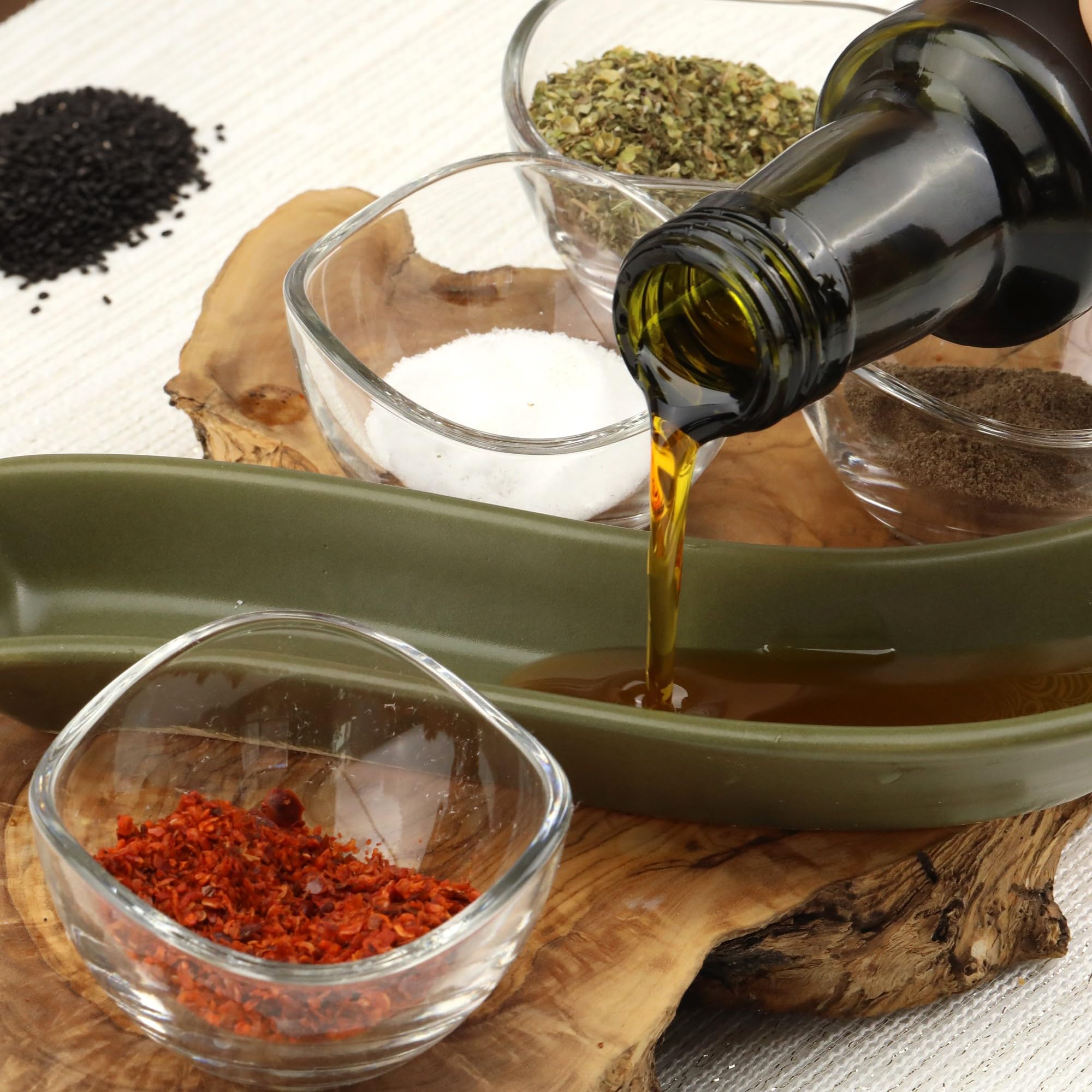 Herbal Wind Black Seed Oil 4600mg in a spoon