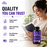 HerbaMe Lutein Eye Support Capsules on a wooden table with a glass of water