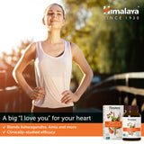 Himalaya HeartCare capsules on a wooden surface