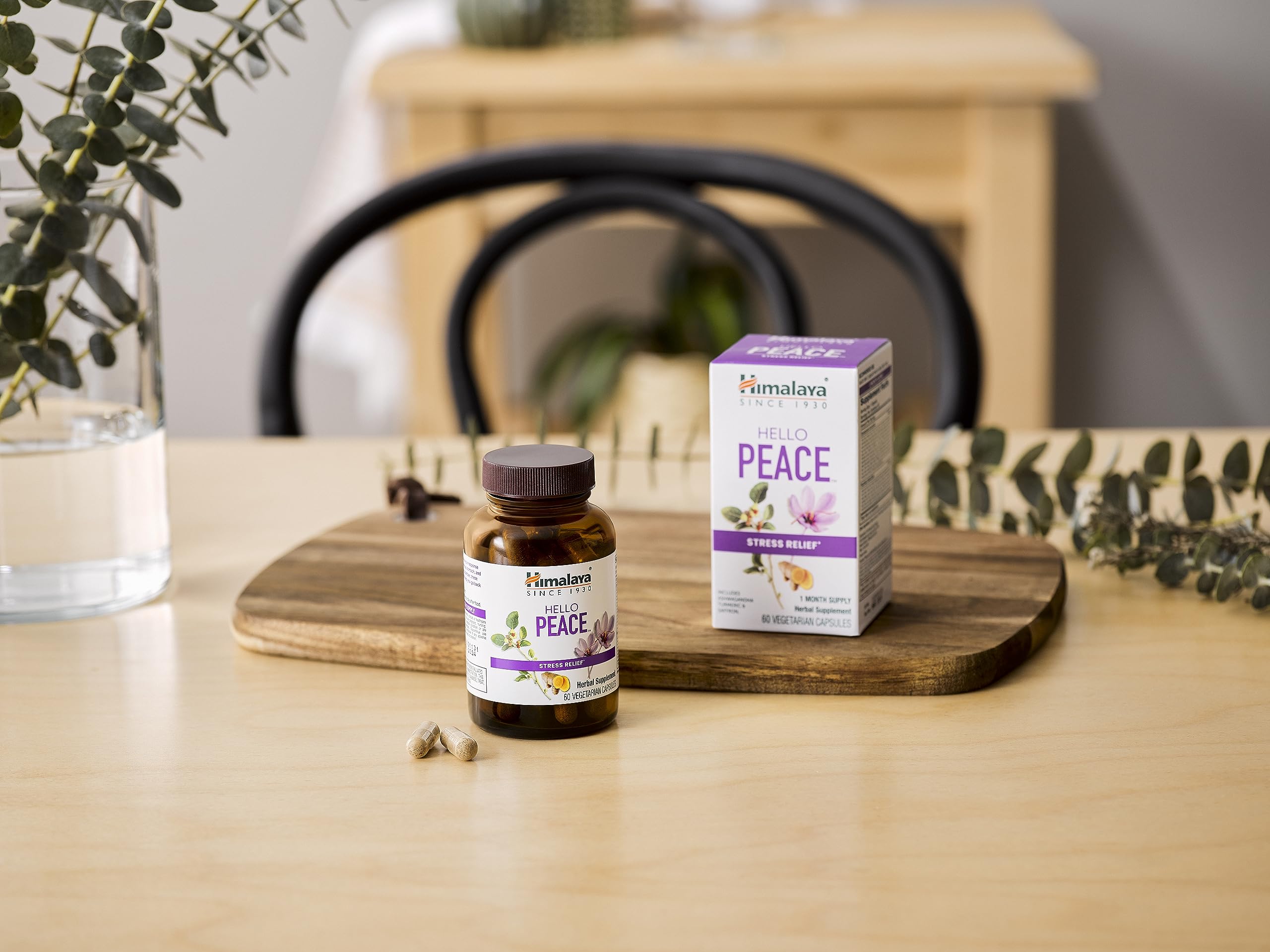 Himalaya Hello Peace Turmeric Supplement 60 Capsules on a wooden surface
