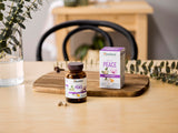 Himalaya Hello Peace Turmeric Supplement 60 Capsules on a wooden surface