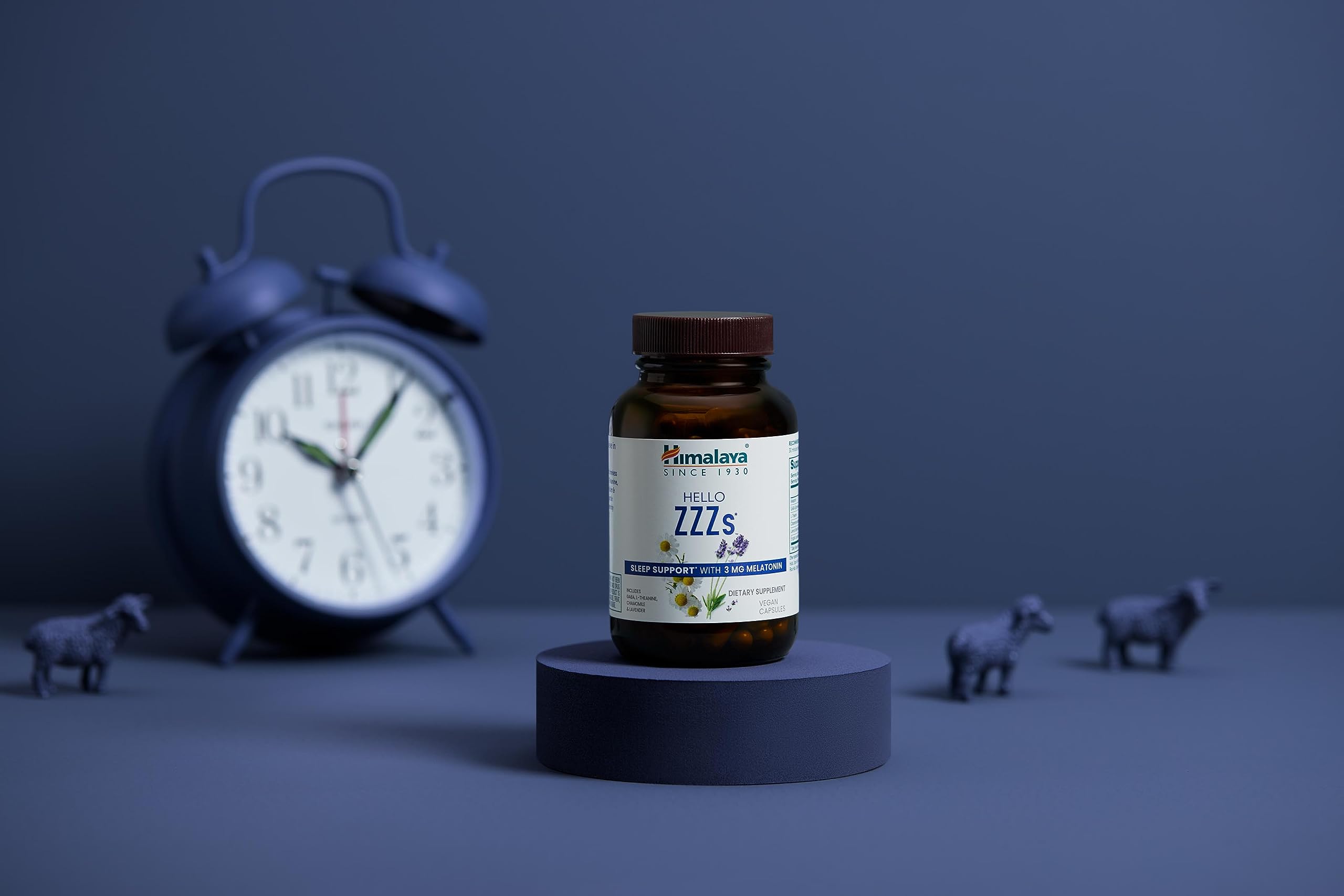Himalaya Hello ZZZs Sleep Supplement on a bedside table