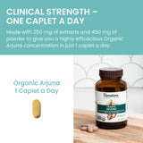 Himalaya Organic Arjuna supplement with a measuring spoon