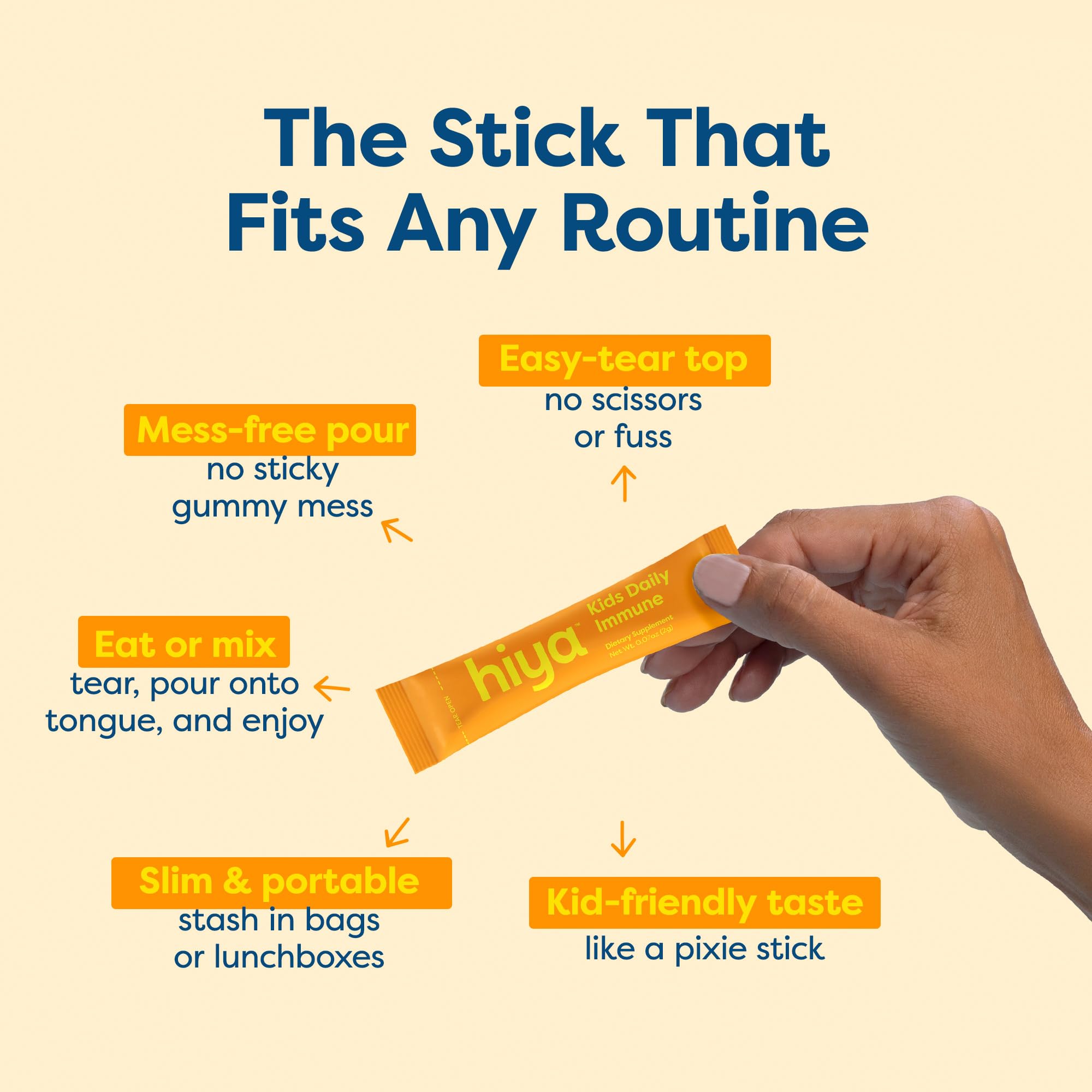 HIYA Daily daily wellness Support Elderberry Supplement Sticks in a child's hand