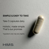 HMS Nutrition Korean Red Panax Ginseng capsules on a wooden table