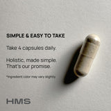 HMS Nutrition Royal Jelly capsules on a wooden surface