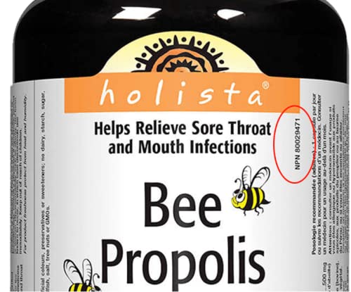 Holista Bee Propolis 500mg capsules with a measuring spoon