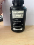 Holistic Method Magnesium Glycinate capsules in hand
