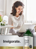 Horbäach Black Seed Oil 472g with a measuring spoon