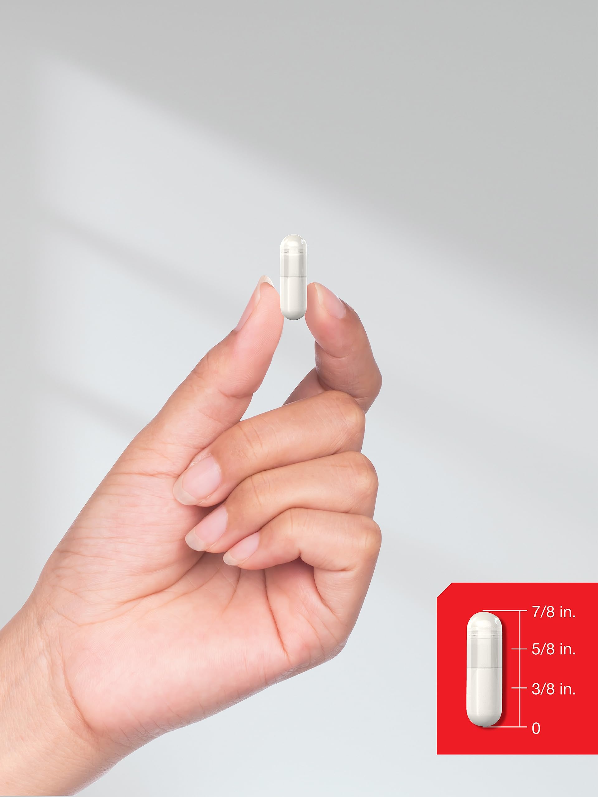 Horbäach Creatine Monohydrate capsules in a hand