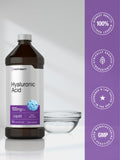 Horbäach Hyaluronic Acid Liquid Supplement bottle with a tablespoon