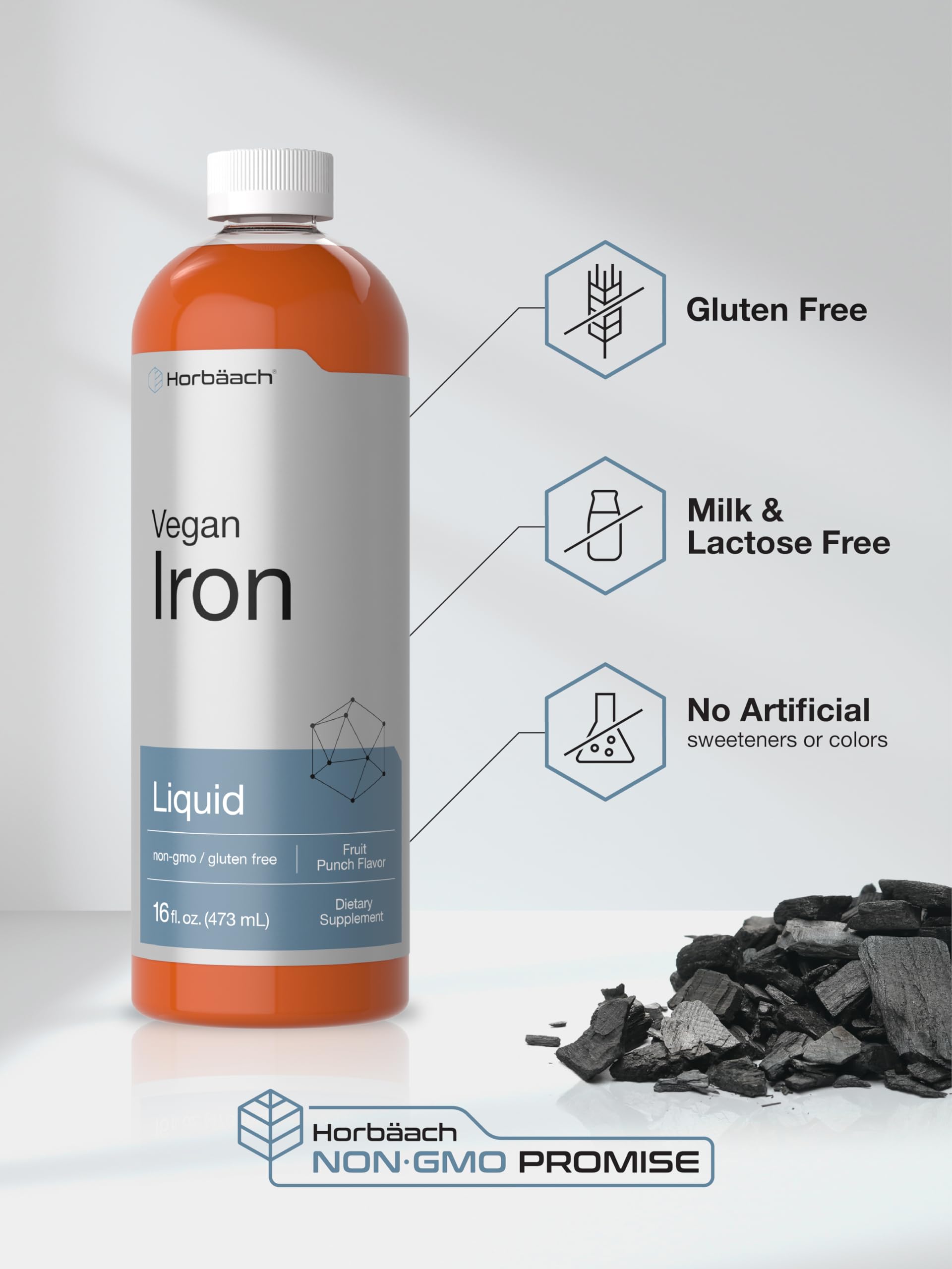 Horbäach Liquid Iron Supplement 531g poured into a spoon