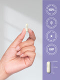 Horbäach Melatonin 10mg capsules with a glass of water
