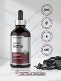 Horbäach Nascent Iodine Liquid Drops on a wooden table