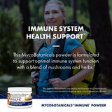 Host Defense Mushroom Powder Supplement in a teaspoon
