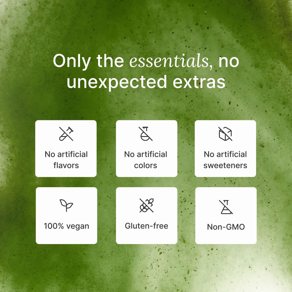 Huel Daily Greens 255g with a spoon for serving