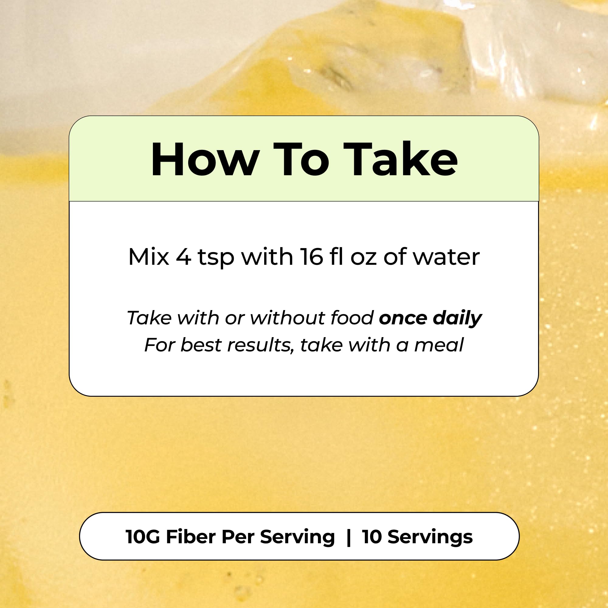 HUM Fiber Supplement Powder mixed in a glass of water
