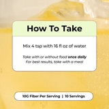HUM Fiber Supplement Powder mixed in a glass of water