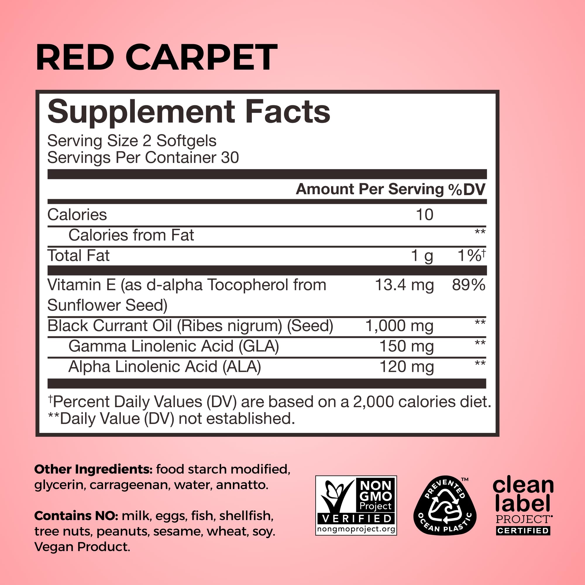 HUM Red Carpet Vitamin E & Black Currant Seed Oil Supplement on a wooden table